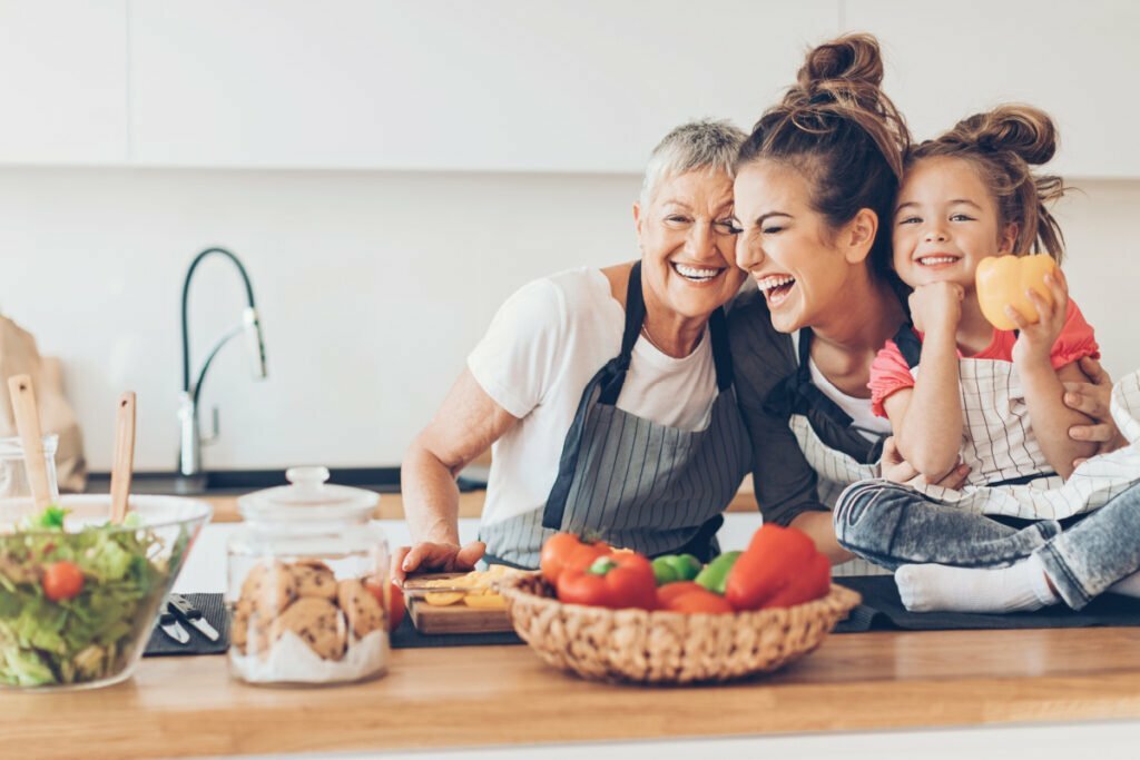 Happy Mother, Daughter, and Grandmother Family Enjoying Healthy Foods in Every Stage of Life